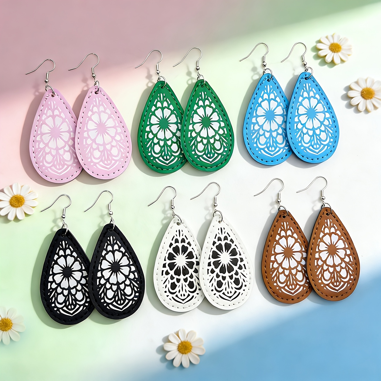 A Pair of Pastoral-style Double-sided Printed Multi-color Sweet and Fashionable Teardrop PU Leather Lightweight Dangle Earrings. Versatile for All Seasons, These Creative PU Leather Earrings Feature Finely Stitched Edges and Teardrop Prints.