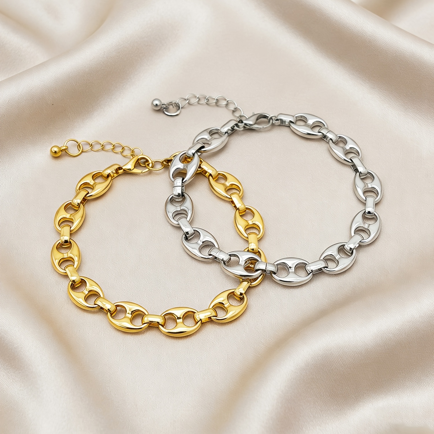 An Elegant Vintage Stainless Steel Bracelet Designed with Hollow Round Holes for Coffee Beans, Featuring a Horseshoe Clasp Chain. This Minimalist Accessory Embodies a Cool, Understated Style